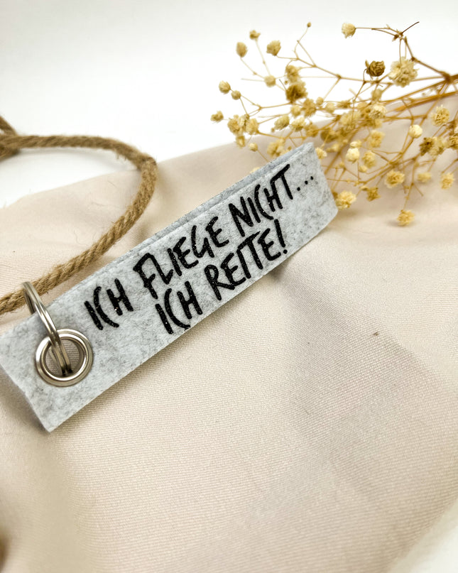 Schlüsselanhänger aus filz "Ich fliege nicht... ich reite."